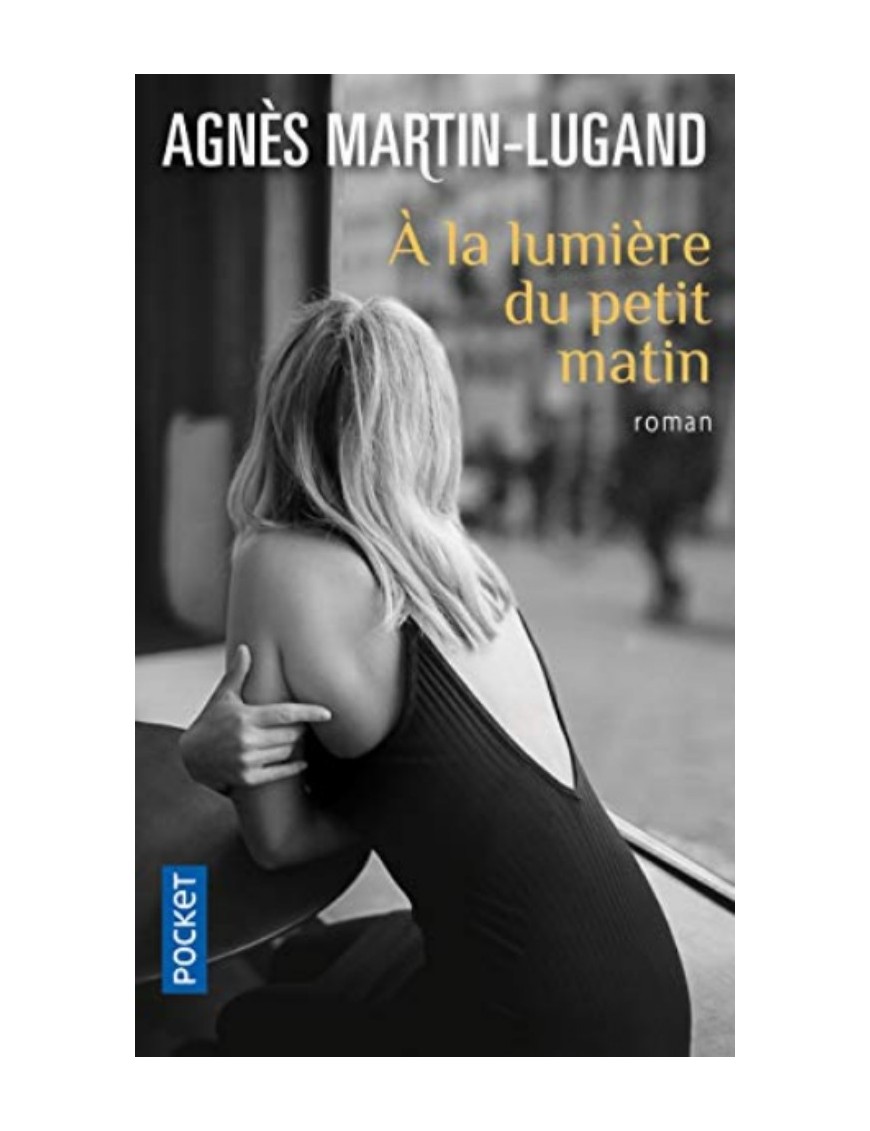 LIVRE DE POCHE A LA LUMIERE DU PETIT MATIN